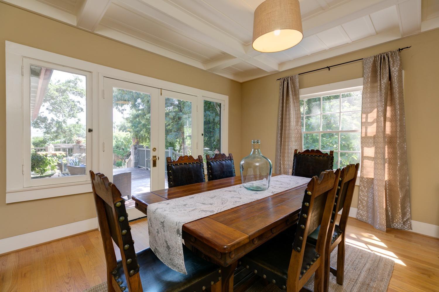 407 Del Norte Road Ojai, CA 93023 - Photo 19 of 39 a view of a dining room with furniture window and wooden floor