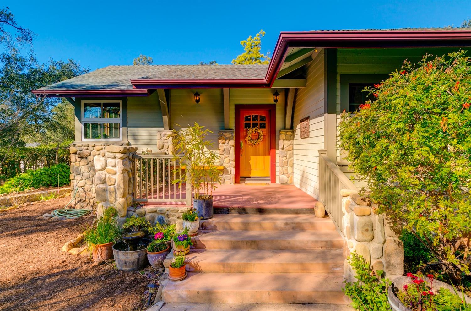 407 Del Norte Road Ojai, CA 93023 - Photo 2 of 39 a front view of a house with a yard