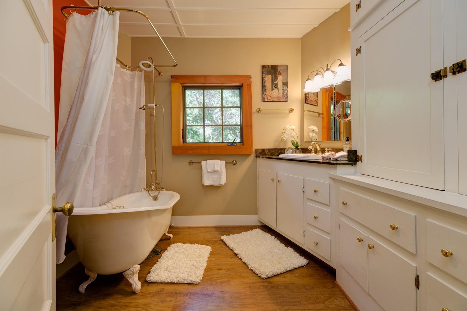 407 Del Norte Road Ojai, CA 93023 - Photo 25 of 39 a bathroom with a sink and a mirror