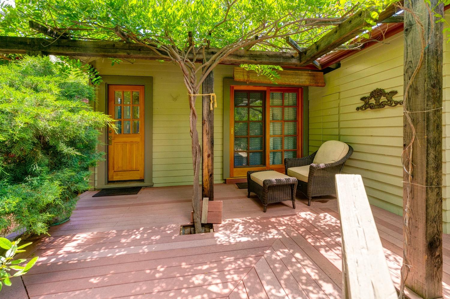 407 Del Norte Road Ojai, CA 93023 - Photo 27 of 39 a view of a patio with a table and chairs