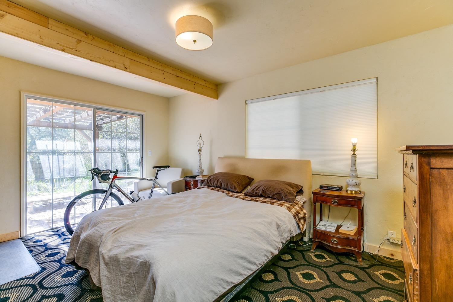 407 Del Norte Road Ojai, CA 93023 - Photo 34 of 39 a bed room with a bed and a table