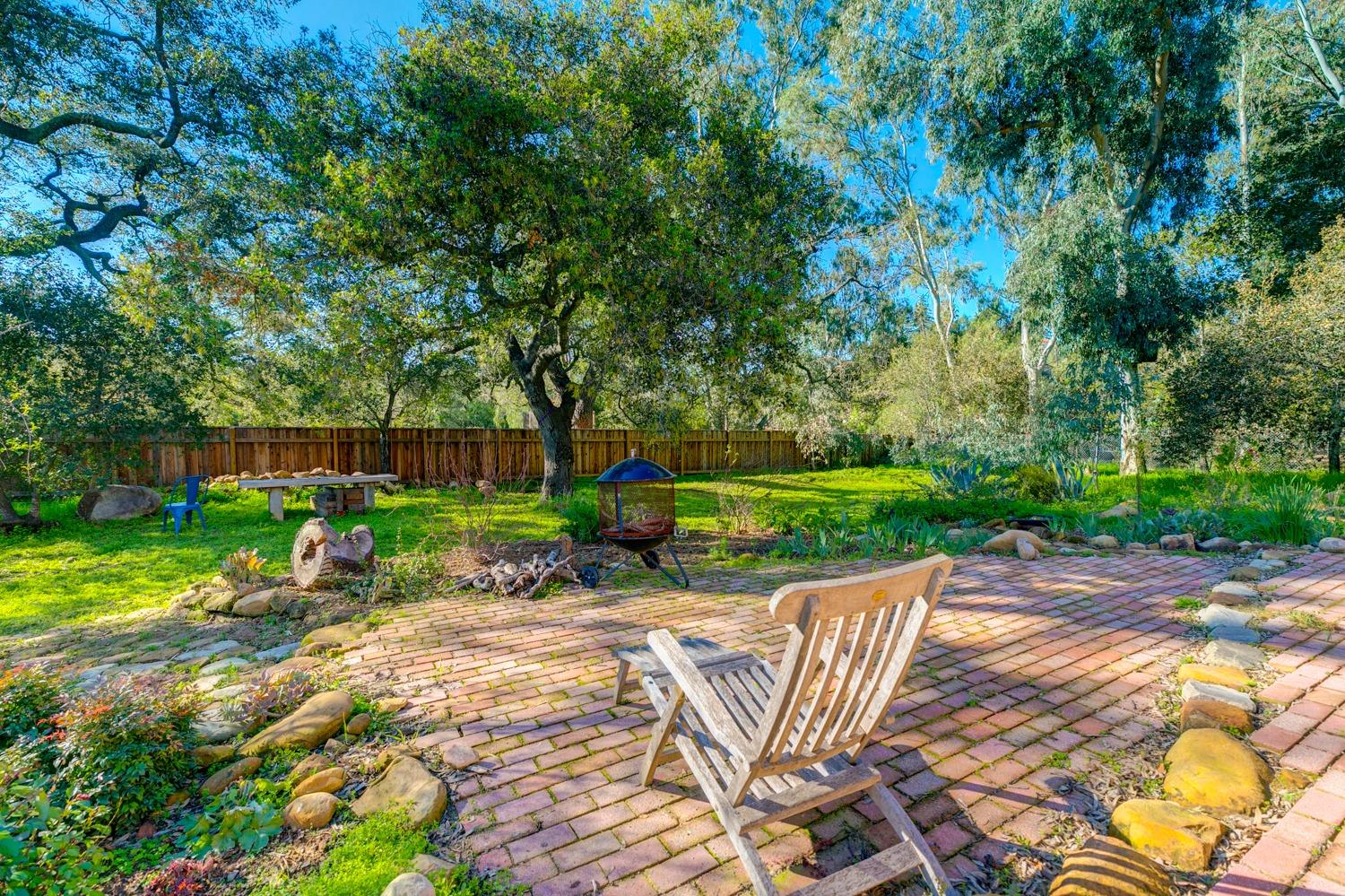 407 Del Norte Road Ojai, CA 93023 - Photo 35 of 39 a view of a chairs and table in a yard