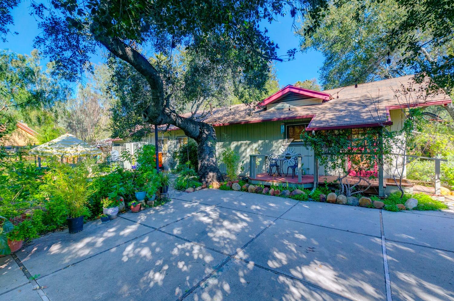 407 Del Norte Road Ojai, CA 93023 - Photo 4 of 39 a view of a patio with a table and a chairs