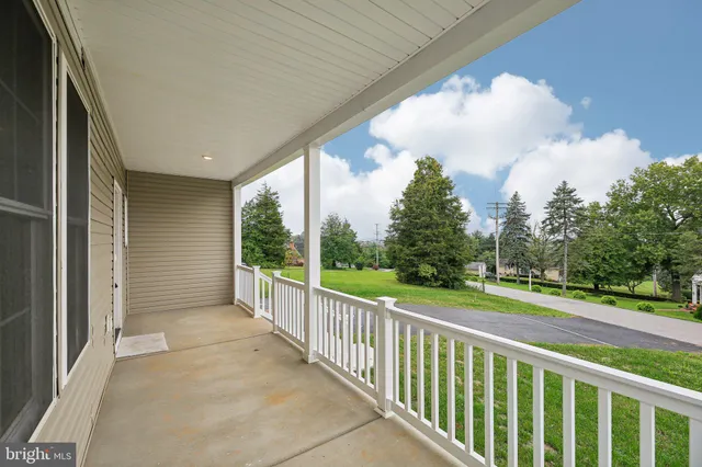 a view of a porch with a yard