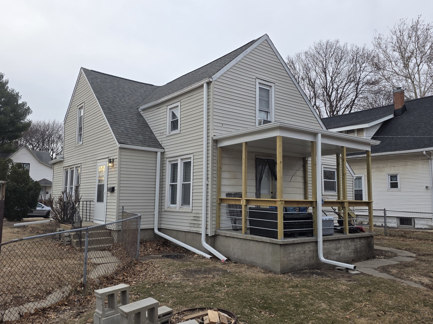 802 East 5th Street Sterling, IL 61081 - Photo 2 of 2 a front view of a house with garden