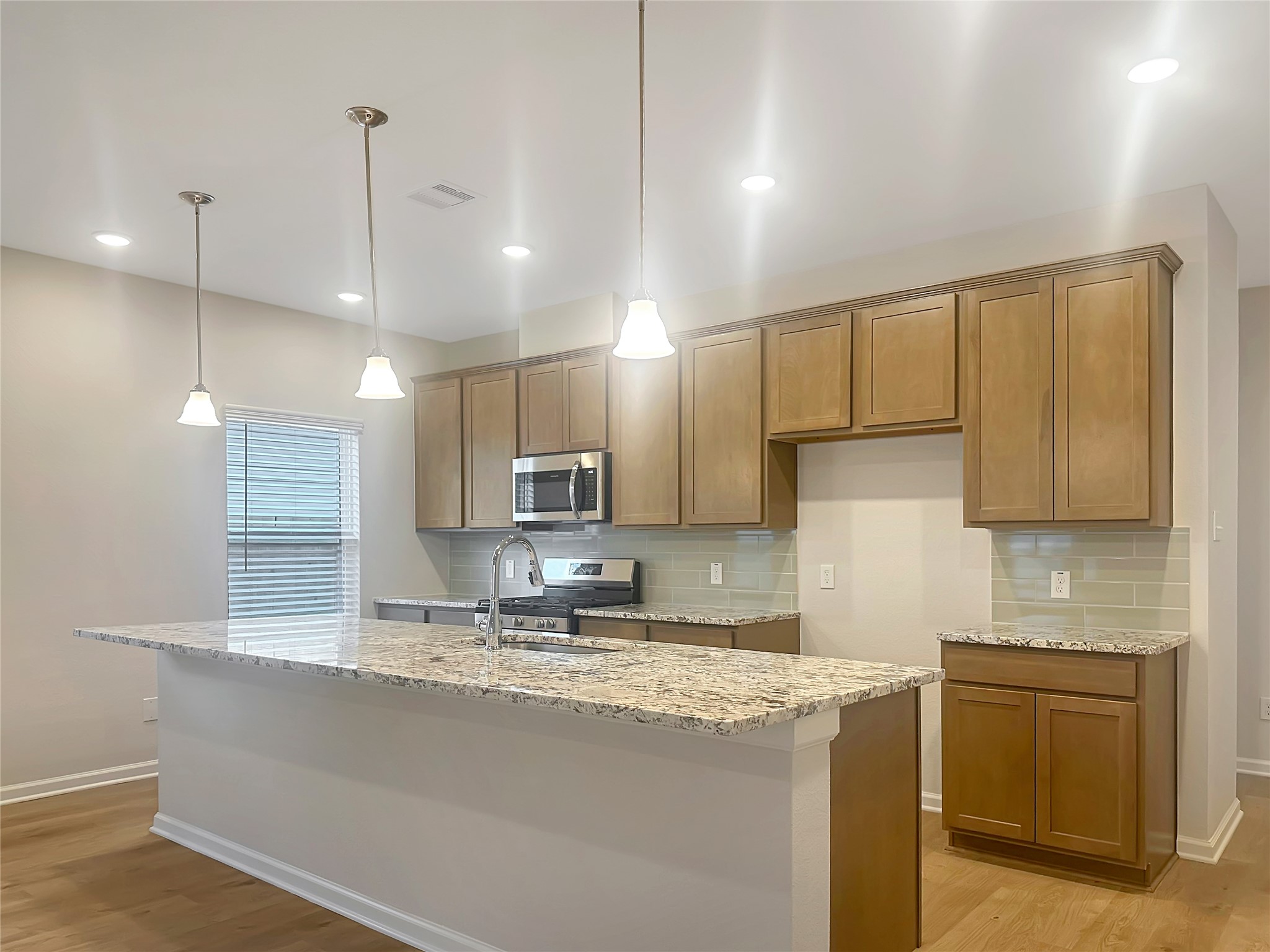 32515 Vly Redstem Way Fulshear, TX 77441 - Photo 8 of 19 The Crawford- Kitchen. Home is under construction, photos used for illustration only; actual features, colors, and upgrades may vary.
