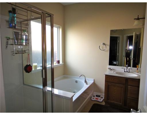 312 San Rafael Drive Portland, TX 78374 - Photo 10 of 10 a bathroom with a sink and mirror
