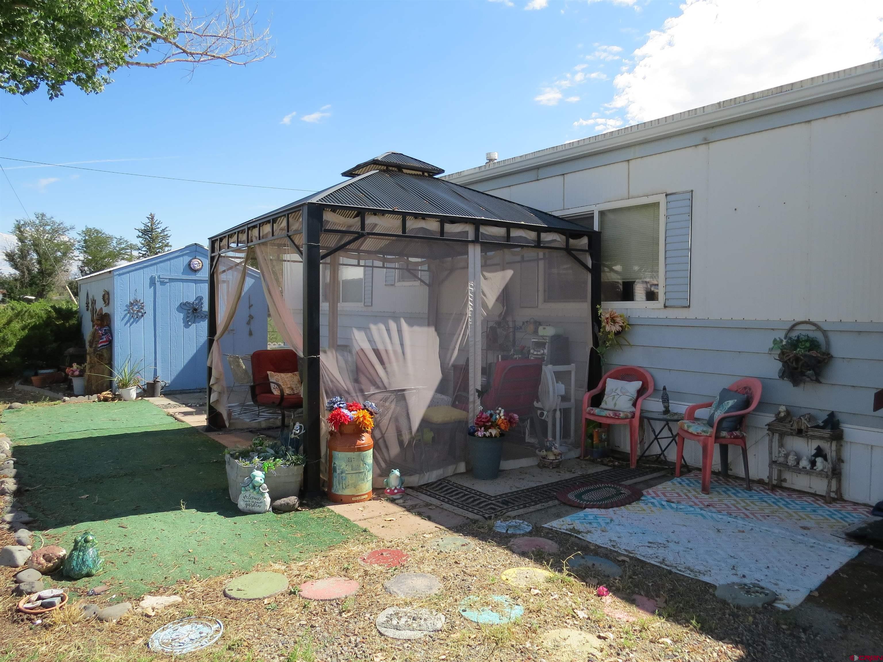 a view of a car park in front of house