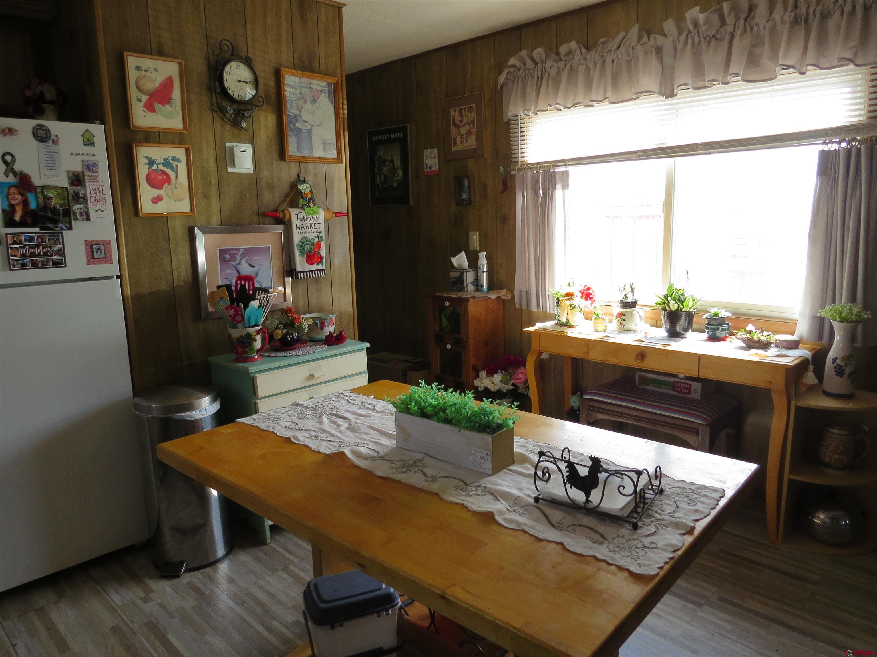 20028 Justice Road Austin, CO 81410 - Photo 10 of 22 a room with furniture and window