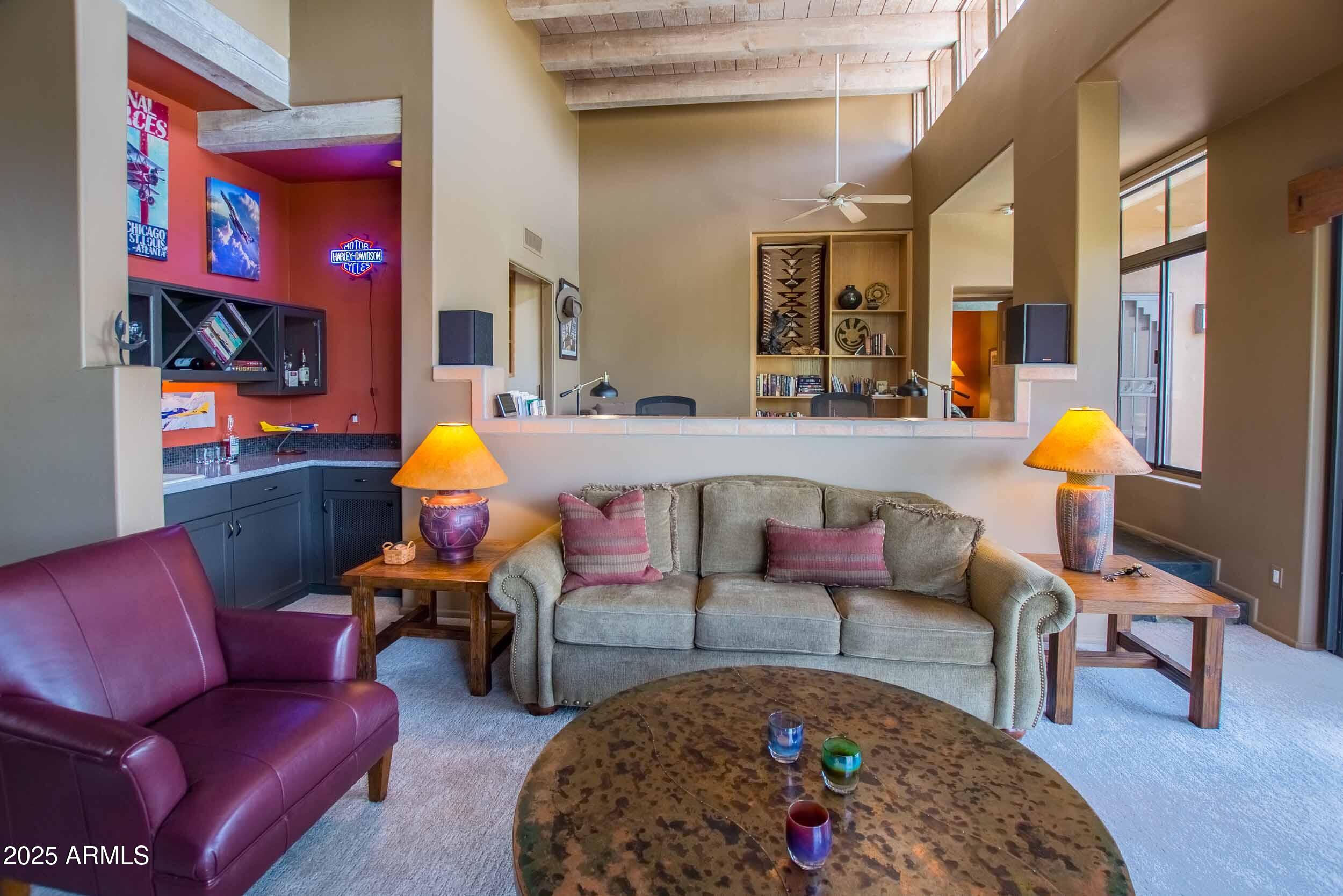 8502 East Cave Creek Road, Unit 61 Carefree, AZ 85377 - Photo 14 of 52 a living room with furniture and a lamp