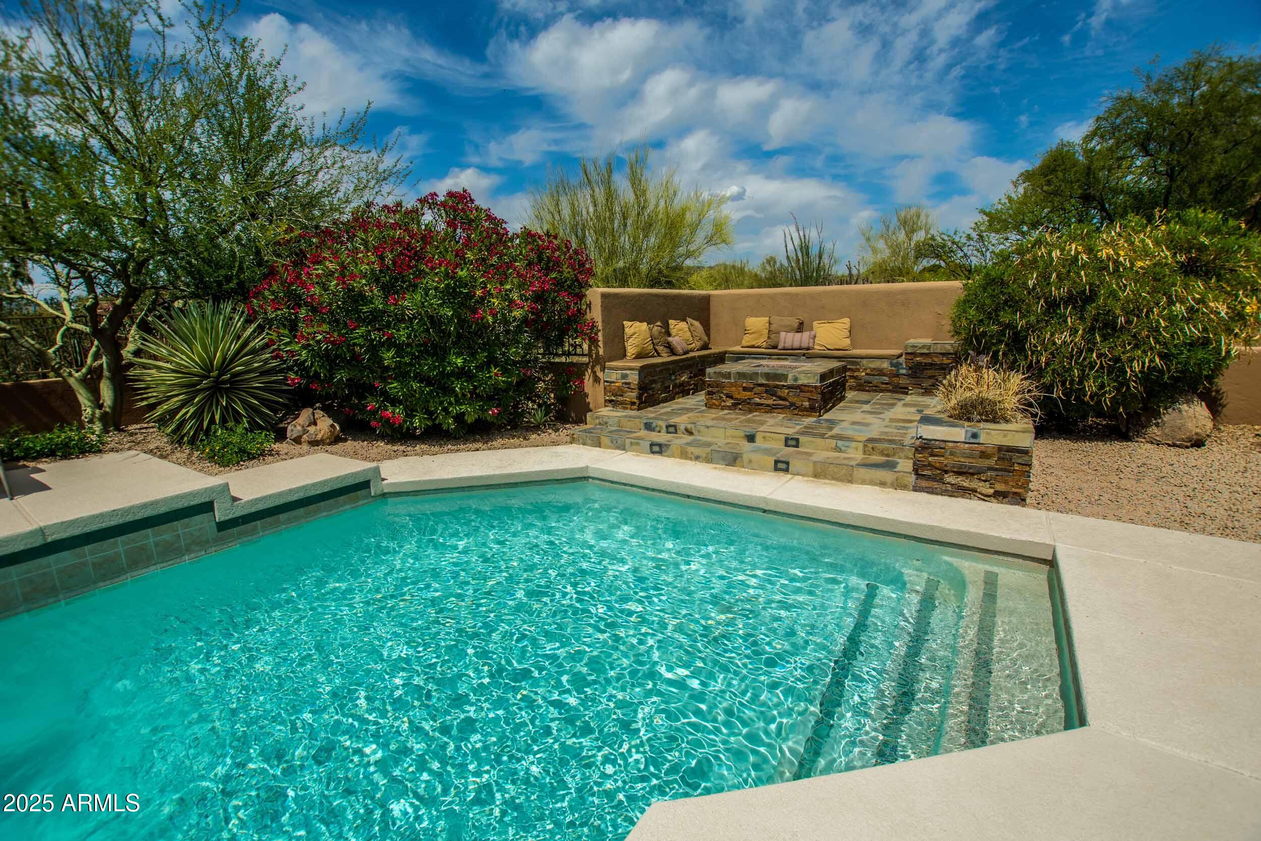 8502 East Cave Creek Road, Unit 61 Carefree, AZ 85377 - Photo 39 of 52 a view of a backyard with sitting area