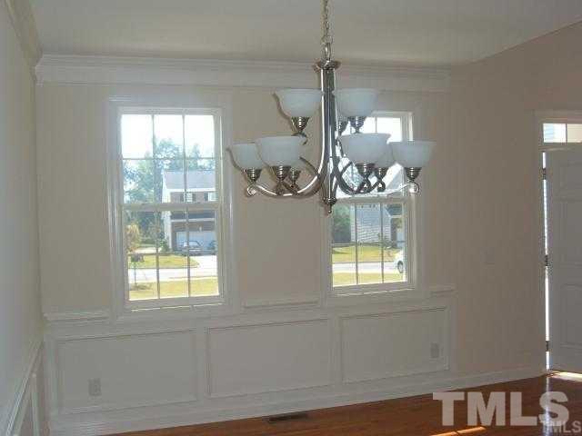 5220 Holly Ridge Farm Road Raleigh, NC 27616 - Photo 4 of 4 a front view of a house with a window