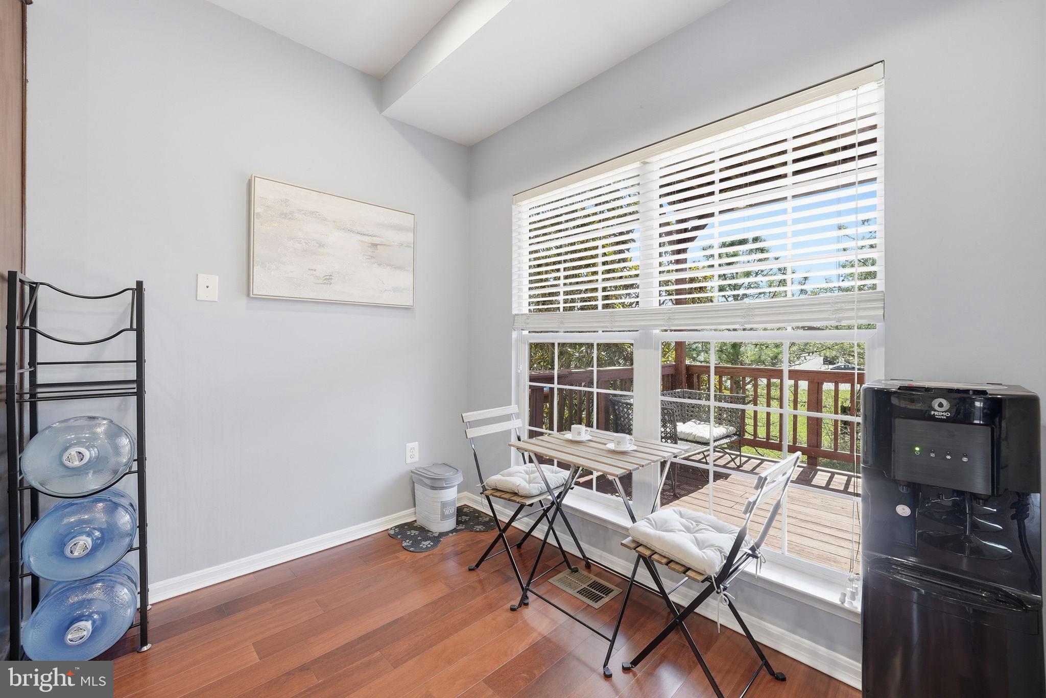 14231 Hunters Run Way Gainesville, VA 20155 - Photo 12 of 41 a work room with furniture and wooden floor