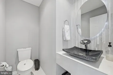 a close view of a toilet in the bathroom