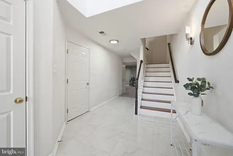 a view of entryway with wooden floor
