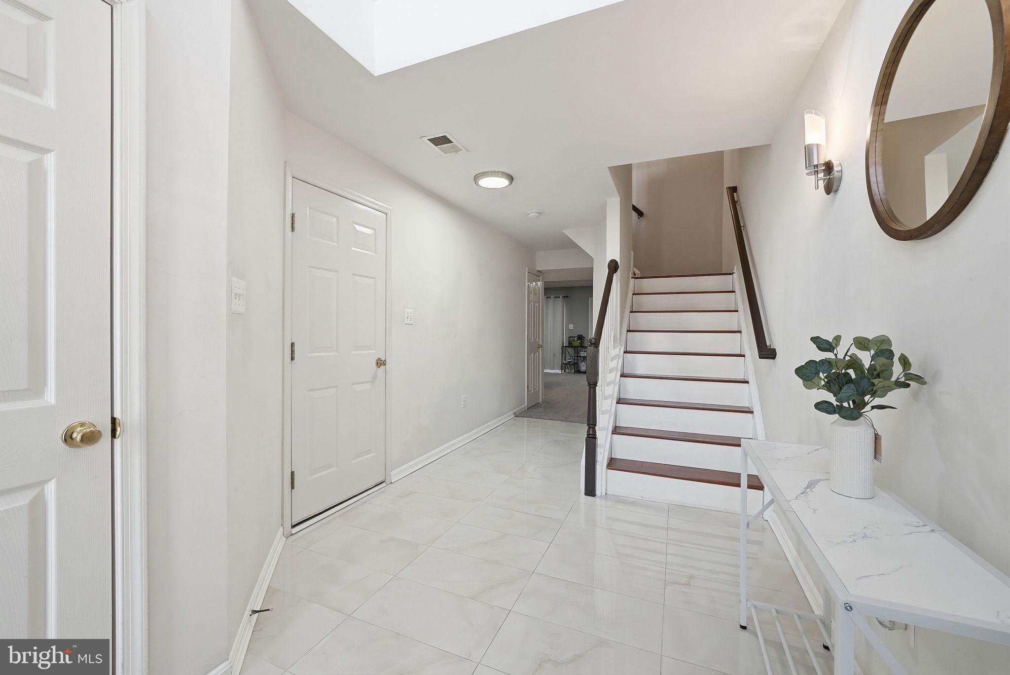14231 Hunters Run Way Gainesville, VA 20155 - Photo 29 of 41 a view of entryway with wooden floor