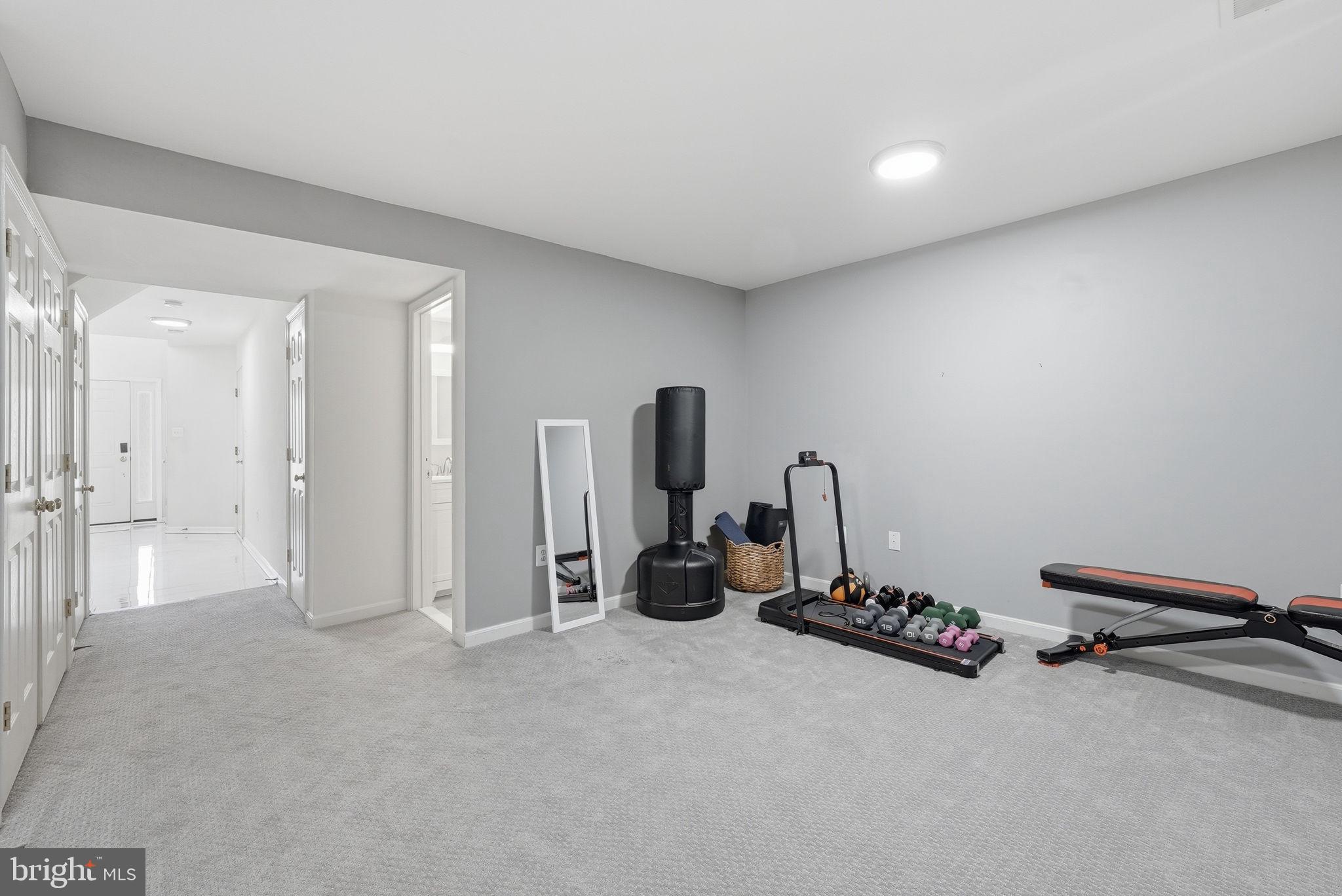 14231 Hunters Run Way Gainesville, VA 20155 - Photo 33 of 41 a view of a room with gym equipment