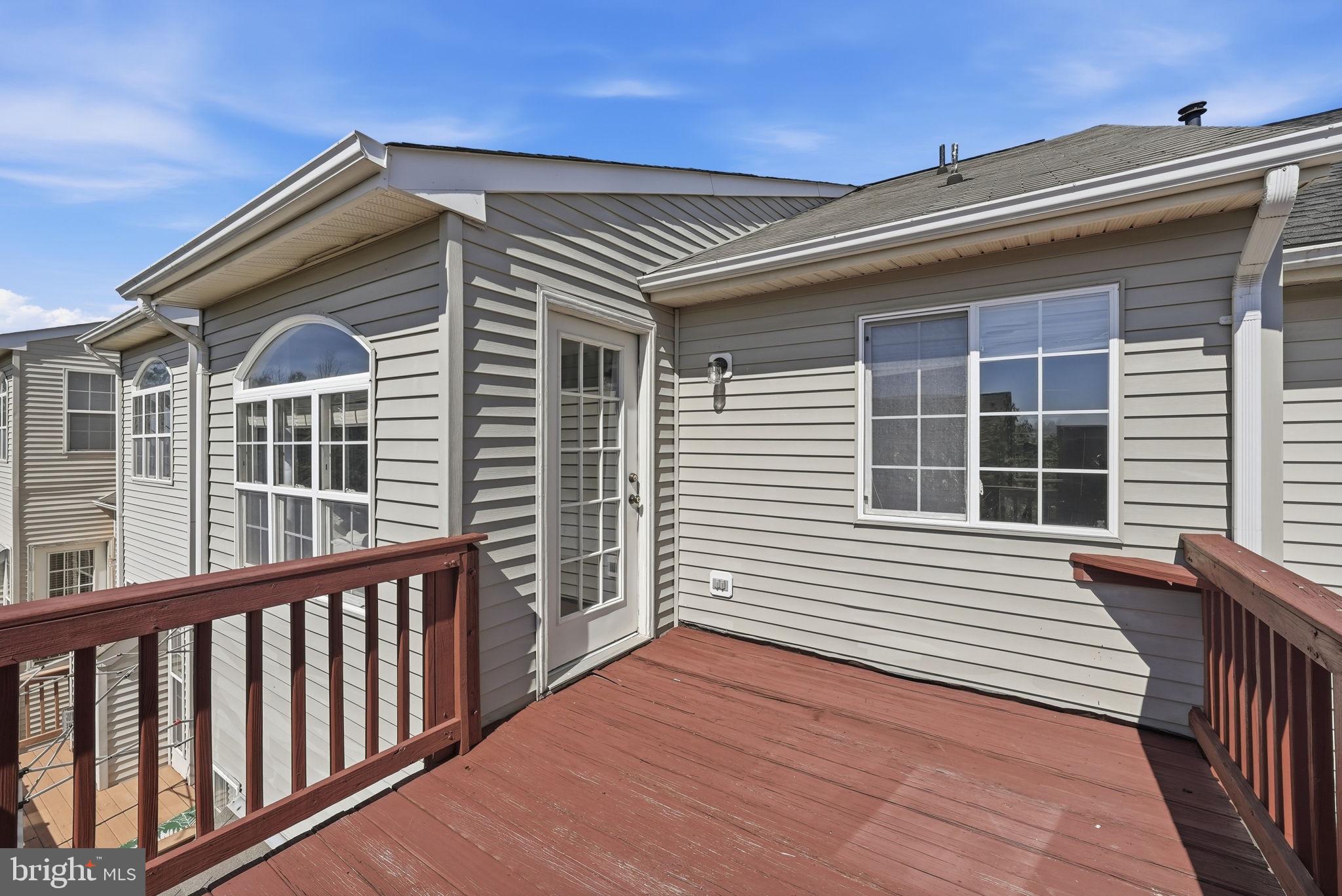 14231 Hunters Run Way Gainesville, VA 20155 - Photo 37 of 41 a view of a house with a large window