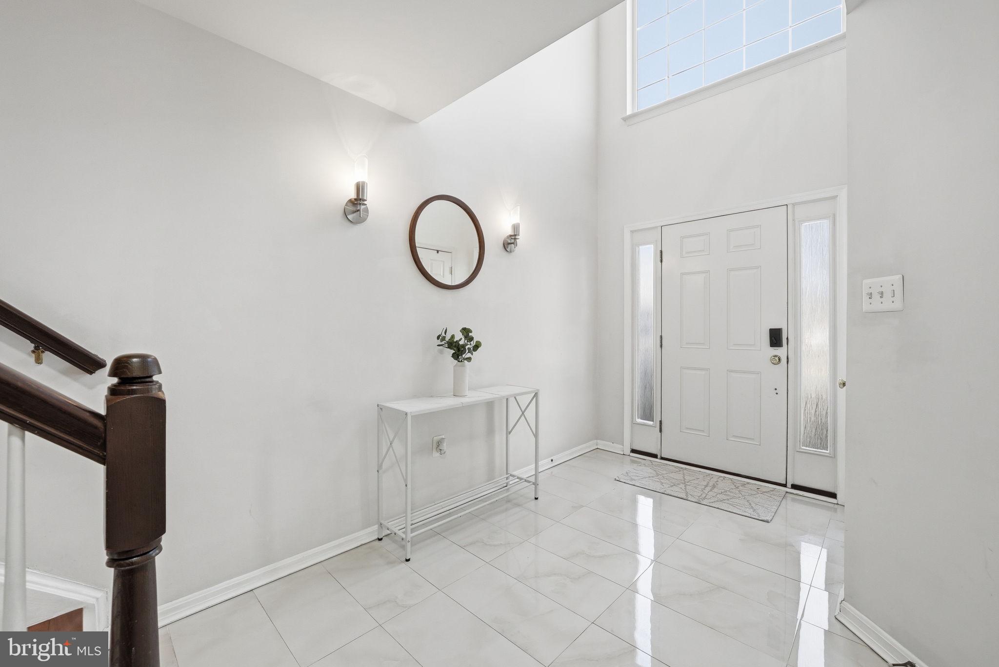 14231 Hunters Run Way Gainesville, VA 20155 - Photo 7 of 41 a view of a room with rack on the wall