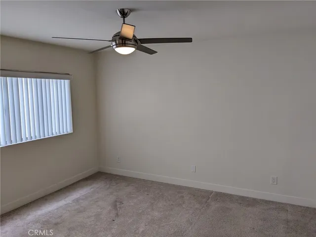 a view of a room with a window