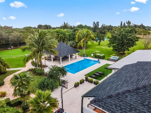 a view of a street with a houses