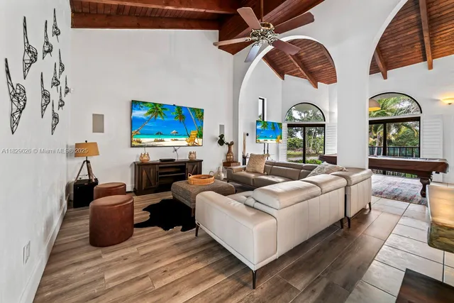 a view of a bedroom with furniture and staircase