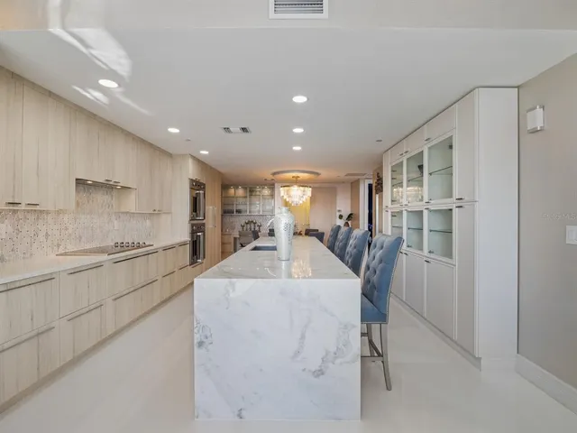 a bedroom with bed and a flat screen tv