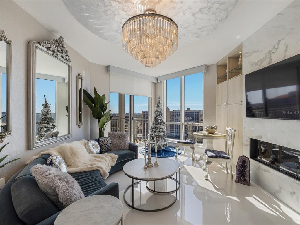 331 Cleveland Street, Unit 1101 Clearwater, FL 33755 - Photo 27 of 77 a living room with furniture and a large window