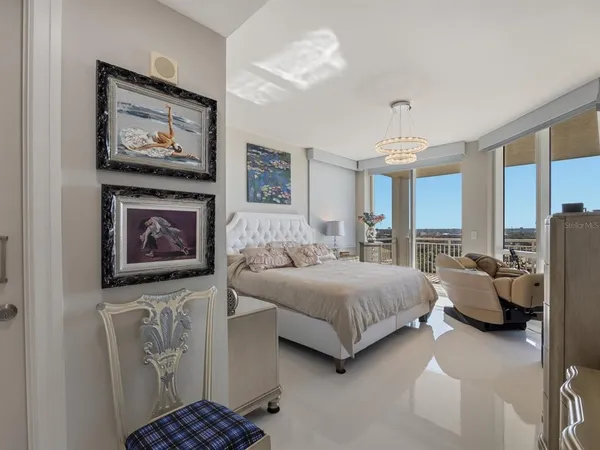 a view of a balcony with wooden floor and fence
