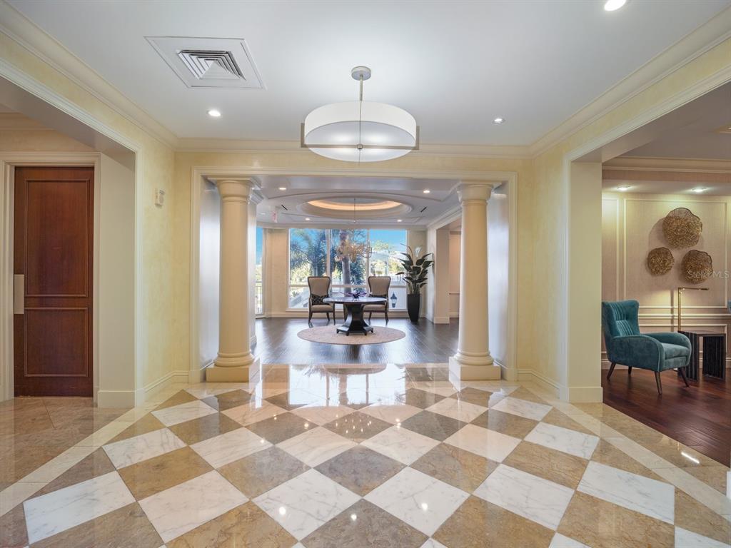 331 Cleveland Street, Unit 1101 Clearwater, FL 33755 - Photo 50 of 77 a view of a dining room with a table and chairs