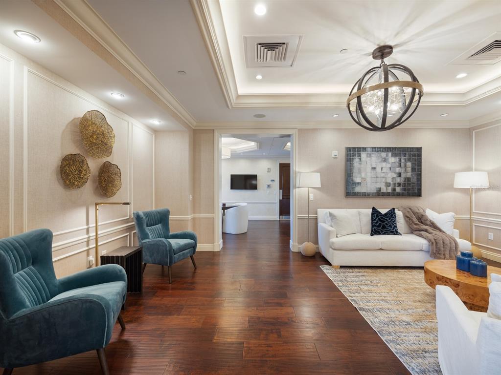 331 Cleveland Street, Unit 1101 Clearwater, FL 33755 - Photo 59 of 77 a living room with furniture kitchen view and a large window