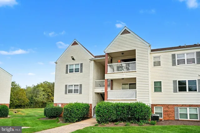 a front of a house with a yard