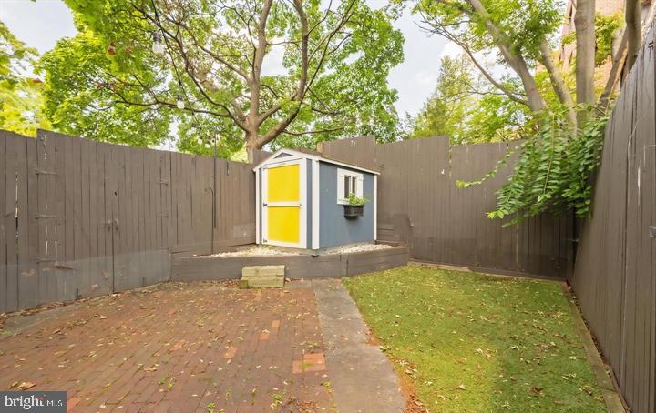 2317 37th Street Northwest Washington, DC 20007 - Photo 51 of 54 Charming garden shed in a serene space.