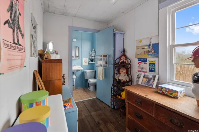 a room with furniture and a wooden floor