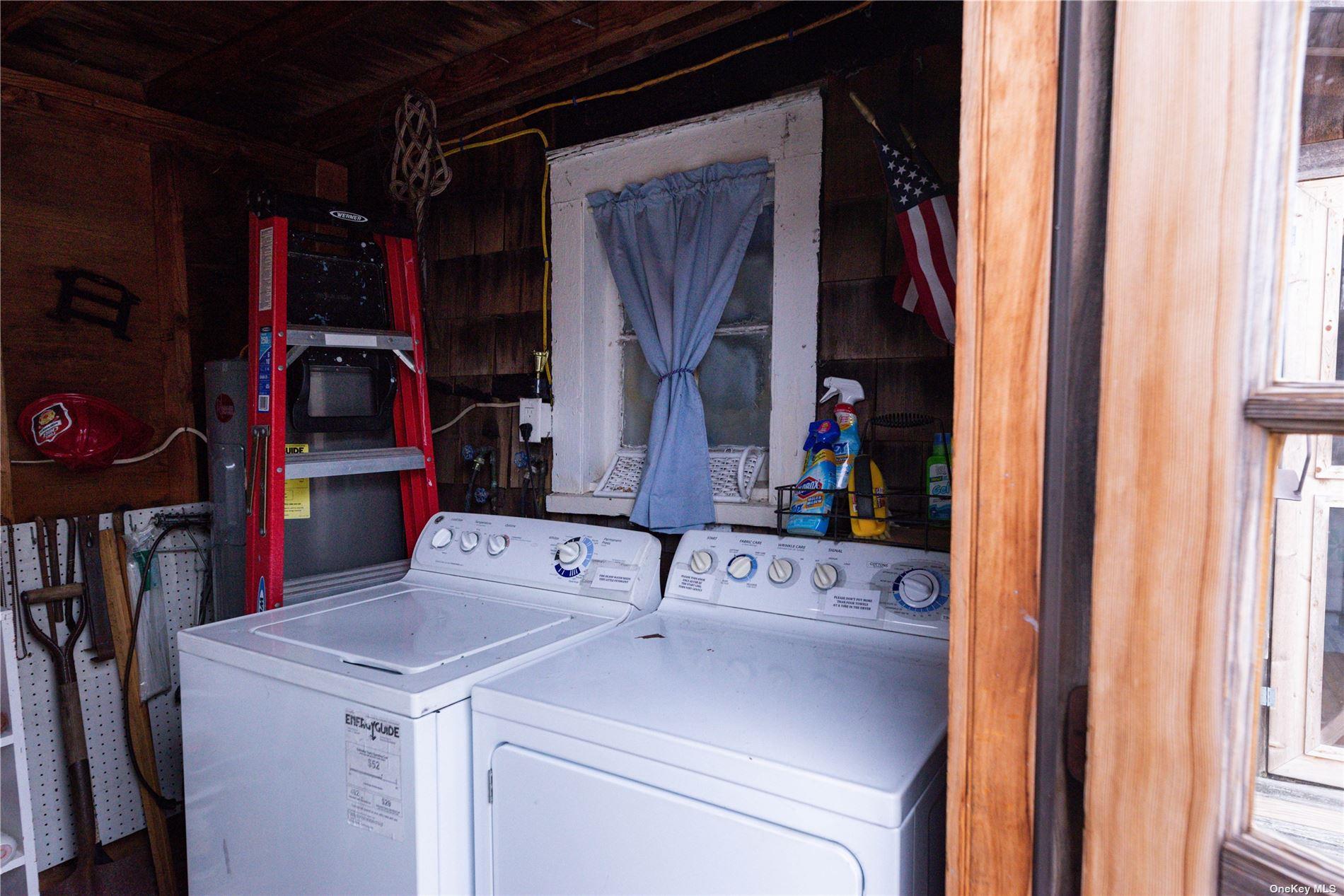 20 Ocean Road Ocean Beach, NY 11770 - Photo 15 of 19 a utility room with dryer and washer