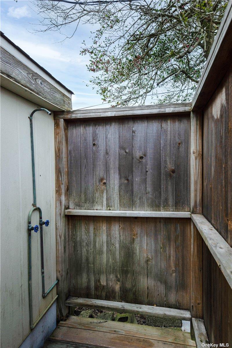 20 Ocean Road Ocean Beach, NY 11770 - Photo 16 of 19 a close view of wooden door