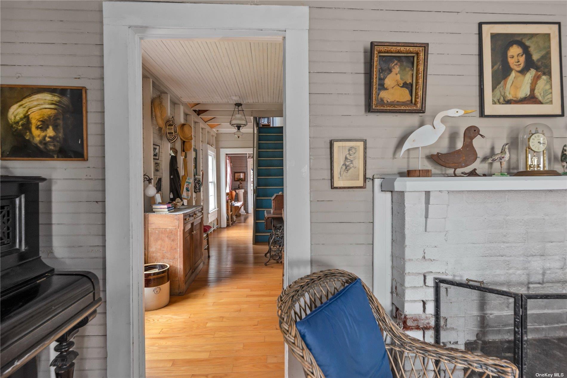 20 Ocean Road Ocean Beach, NY 11770 - Photo 4 of 19 a living room with furniture and a flat screen tv