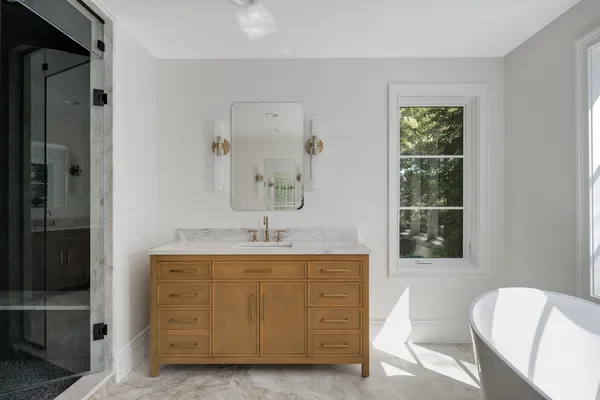 a kitchen with stainless steel appliances granite countertop a stove and a sink