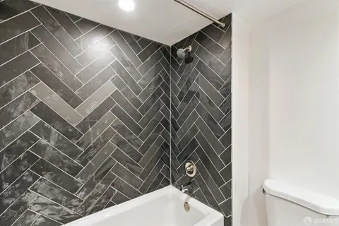 a bathroom with a sink and toilet