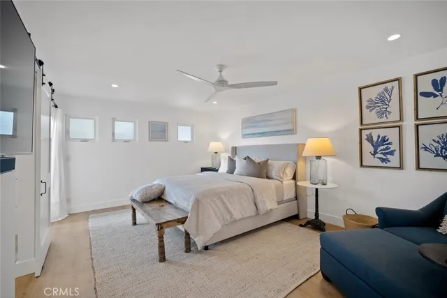 a bathroom with double vanity sink and a mirror