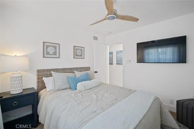 a bathroom with a sink a mirror and shower