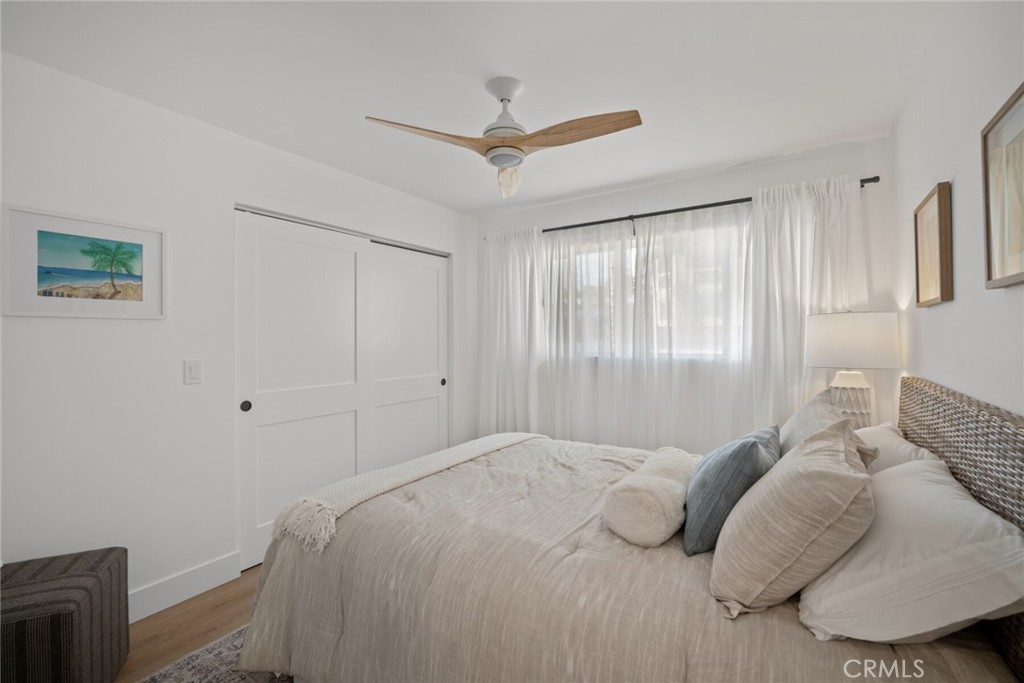 24272 Selva Road Dana Point, CA 92629 - Photo 24 of 59 a bedroom with a bed and a window