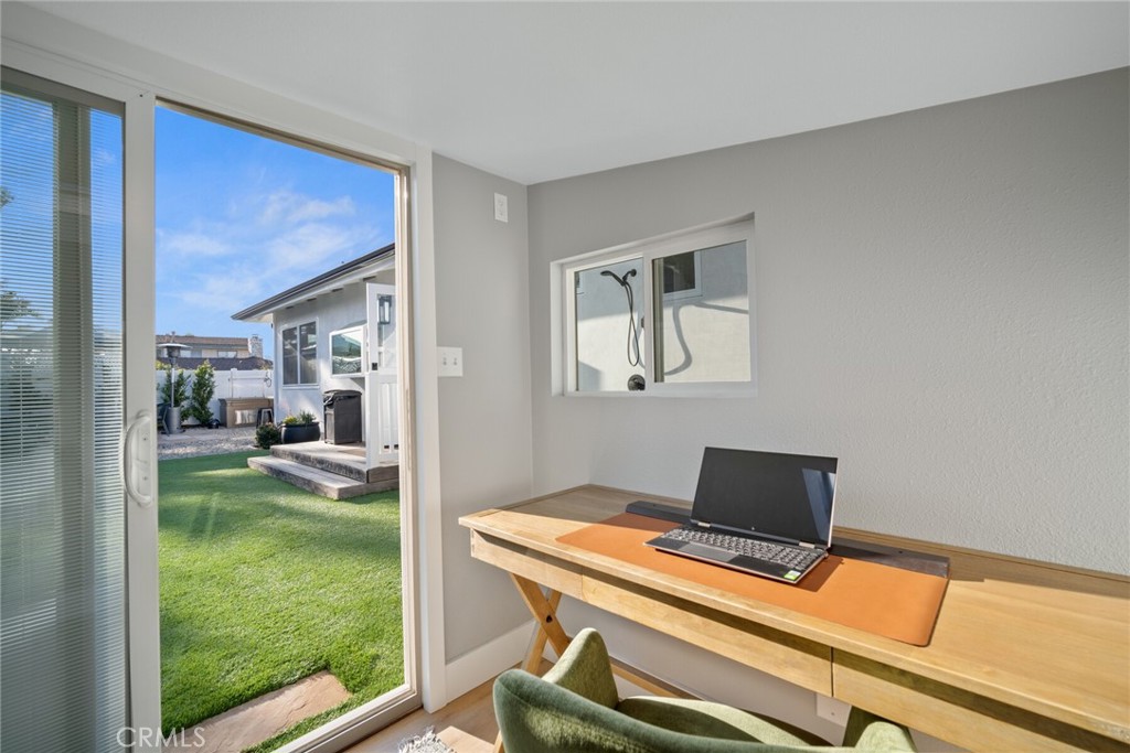 24272 Selva Road Dana Point, CA 92629 - Photo 29 of 59 a view of a livingroom with furniture and garden view