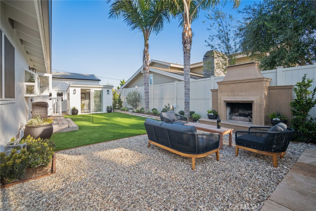 24272 Selva Road Dana Point, CA 92629 - Photo 30 of 59 a view of a house with backyard and garden