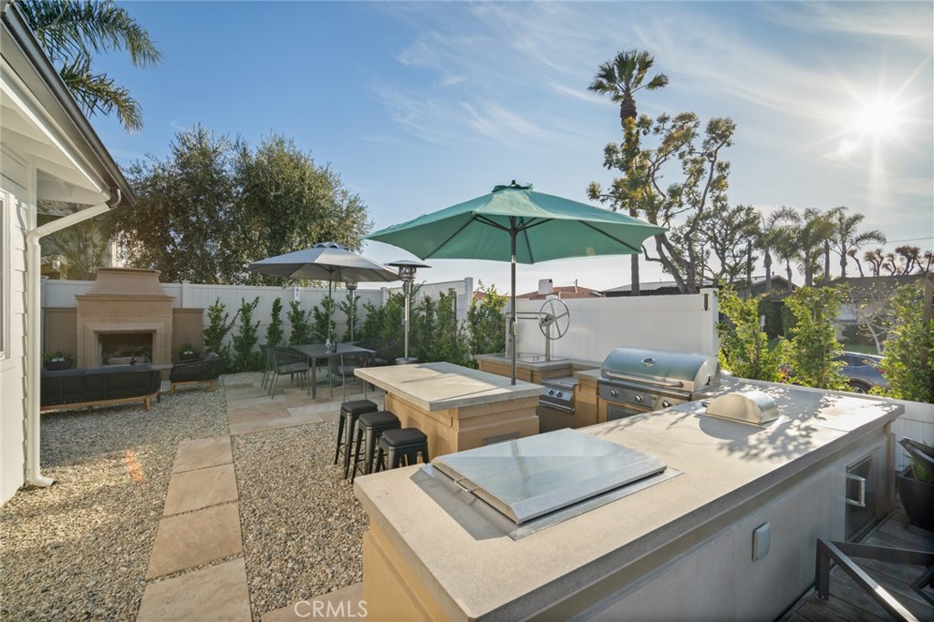 24272 Selva Road Dana Point, CA 92629 - Photo 32 of 59 a view of backyard of house with seating space