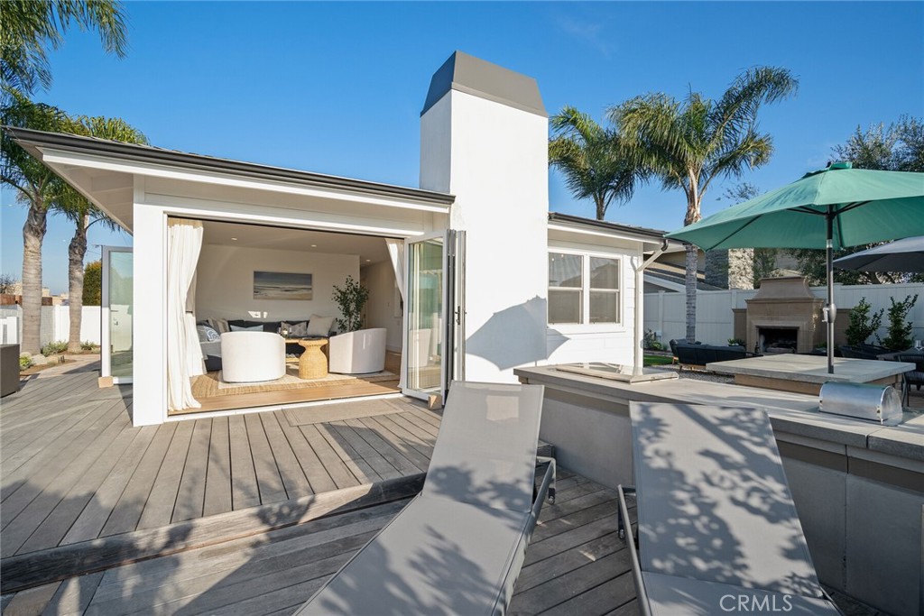 24272 Selva Road Dana Point, CA 92629 - Photo 37 of 59 a view of a house with backyard sitting area and swimming pool