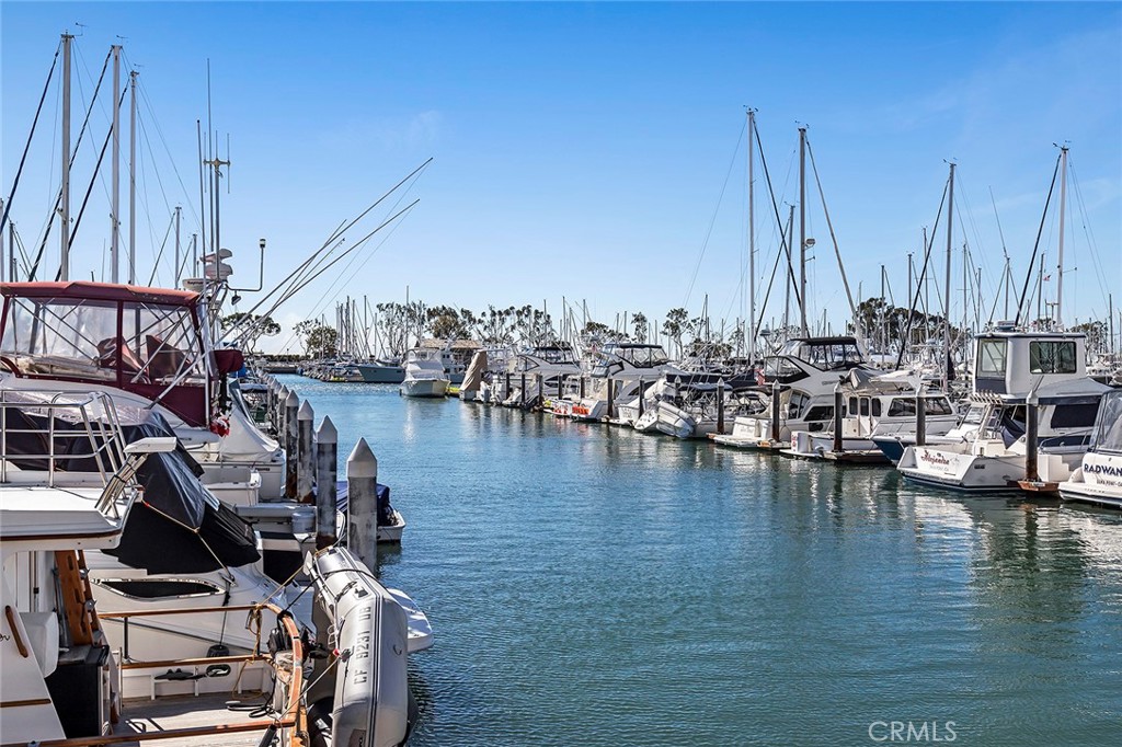 24272 Selva Road Dana Point, CA 92629 - Photo 56 of 59 a view of a lake with boats next to a bridge