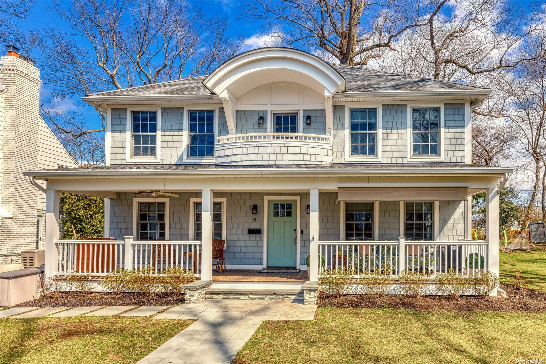 a front view of a house with a porch
