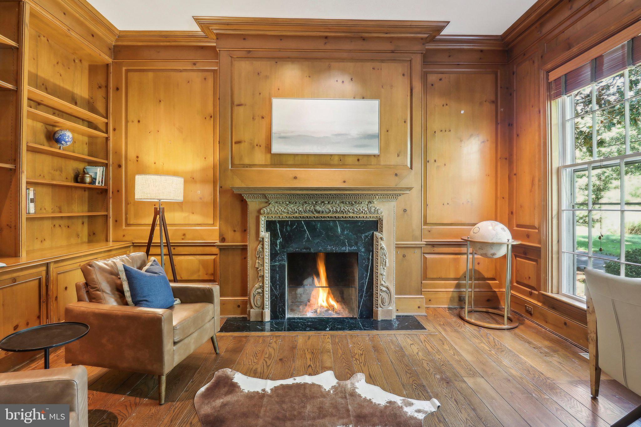 10650 Gunston Road Lorton, VA 22079 - Photo 11 of 73 a living room with furniture and a fireplace