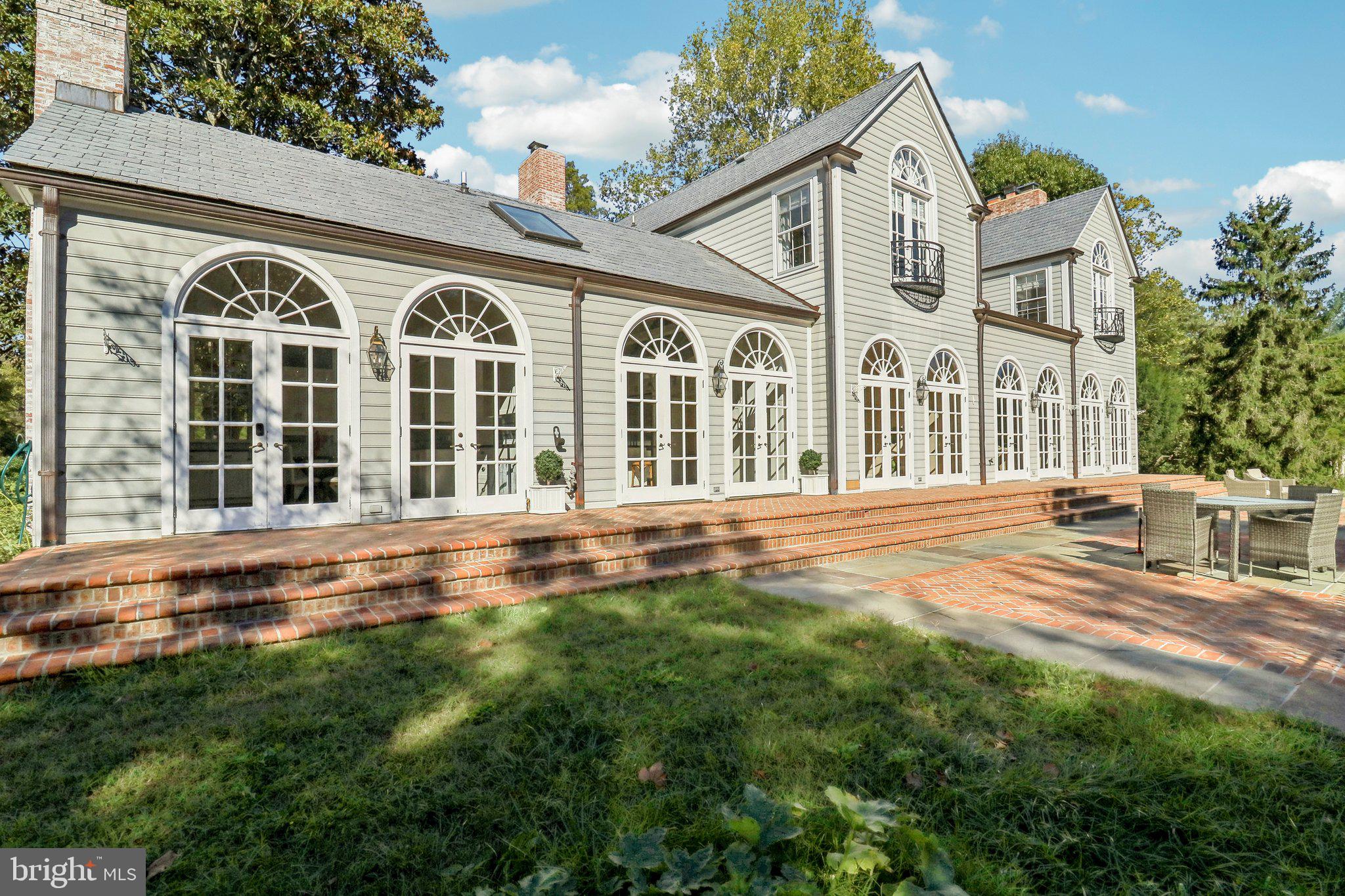 10650 Gunston Road Lorton, VA 22079 - Photo 3 of 73 front view of a house with a yard
